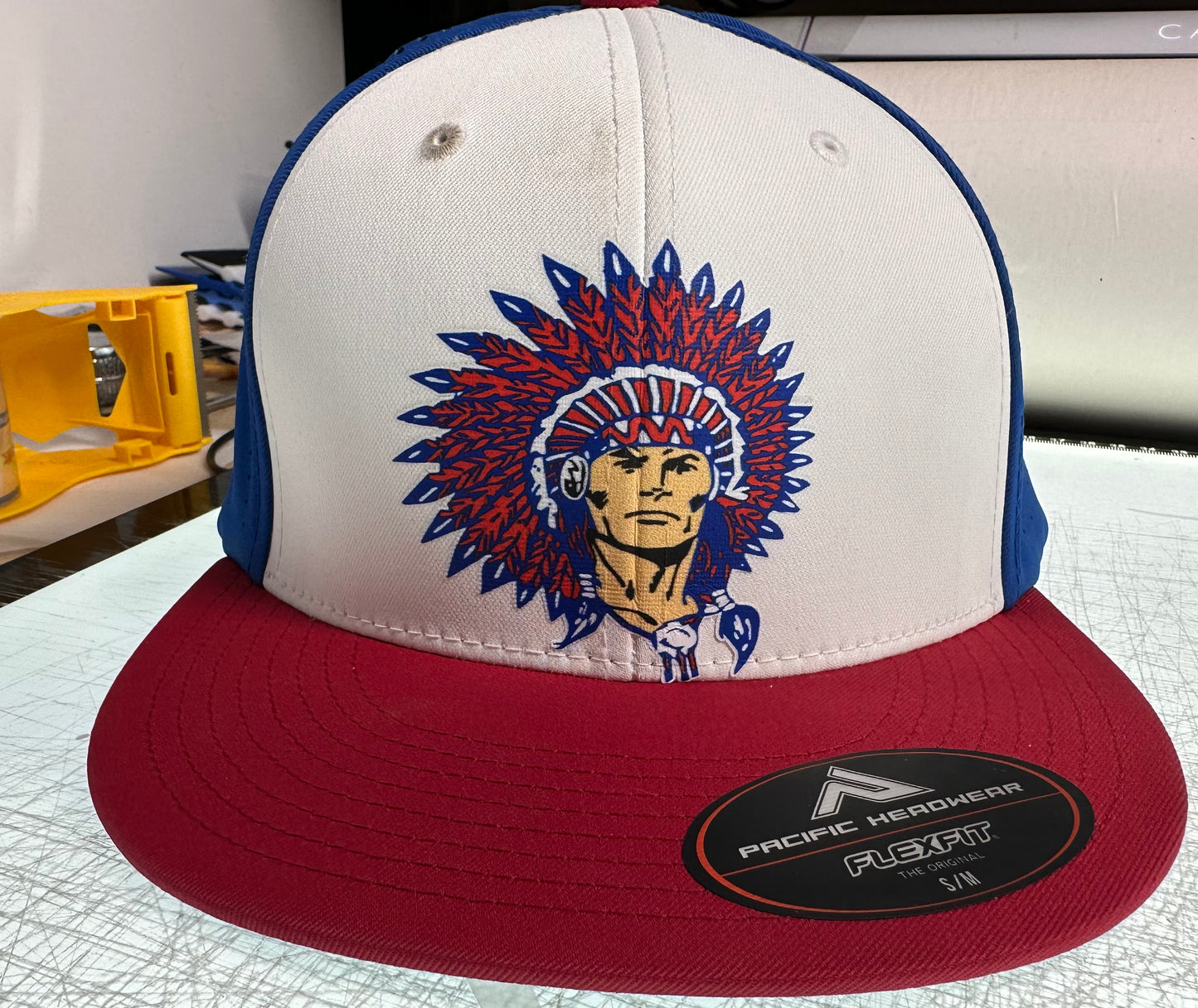 Fitted red, White and blue hat warrior head